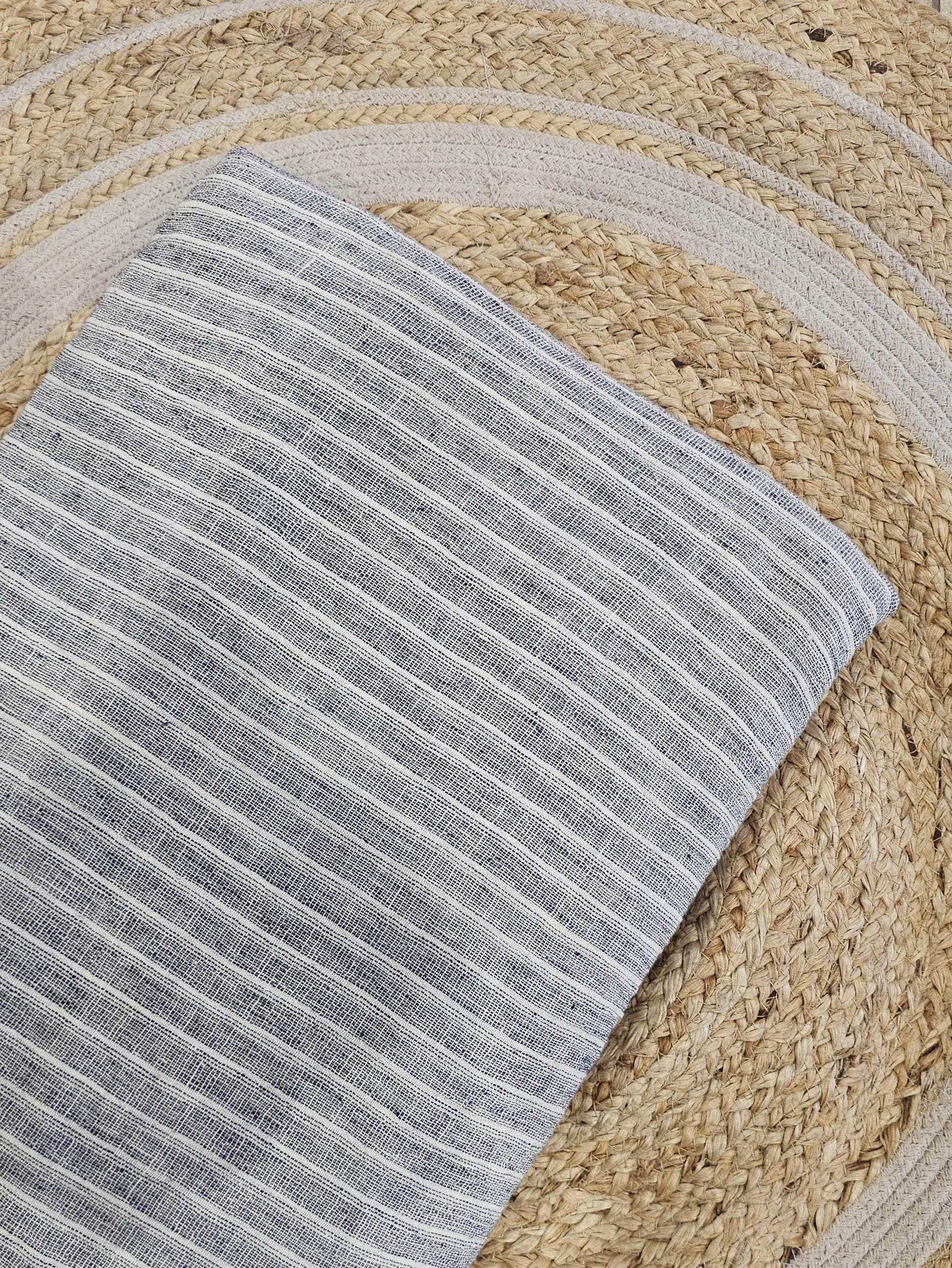 Grey thin stripes kala cotton textile fabric